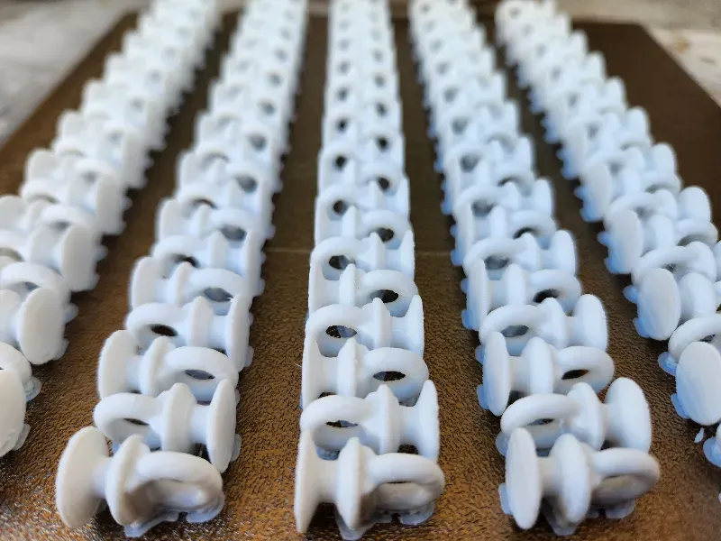 Sheet of 3D printed parts