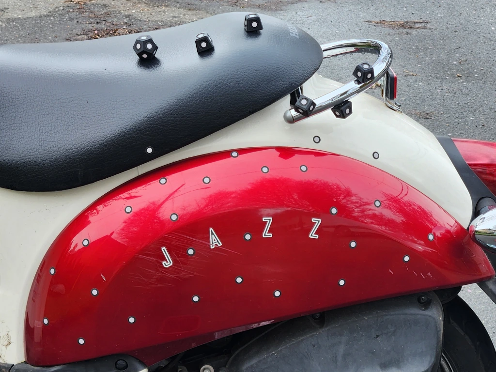 Scooter covered in markers prepared for 3D scanning.